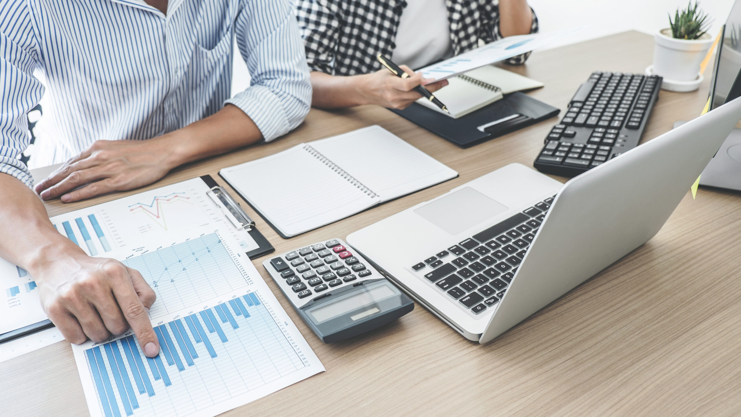 Finance manager presenting and discussing company growth project